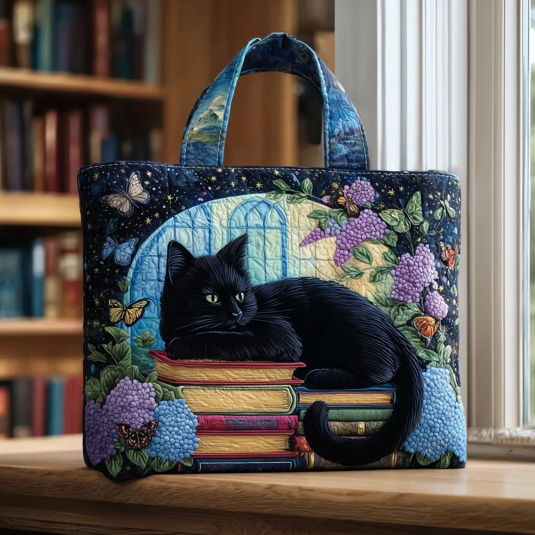 Handgemachte Chat Noir Tasche auf Büchern